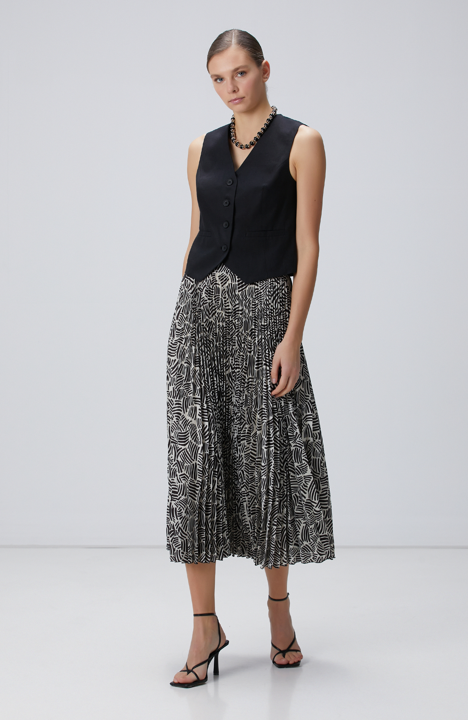 Kırık Beyaz Siyah Desenli Midi Etek