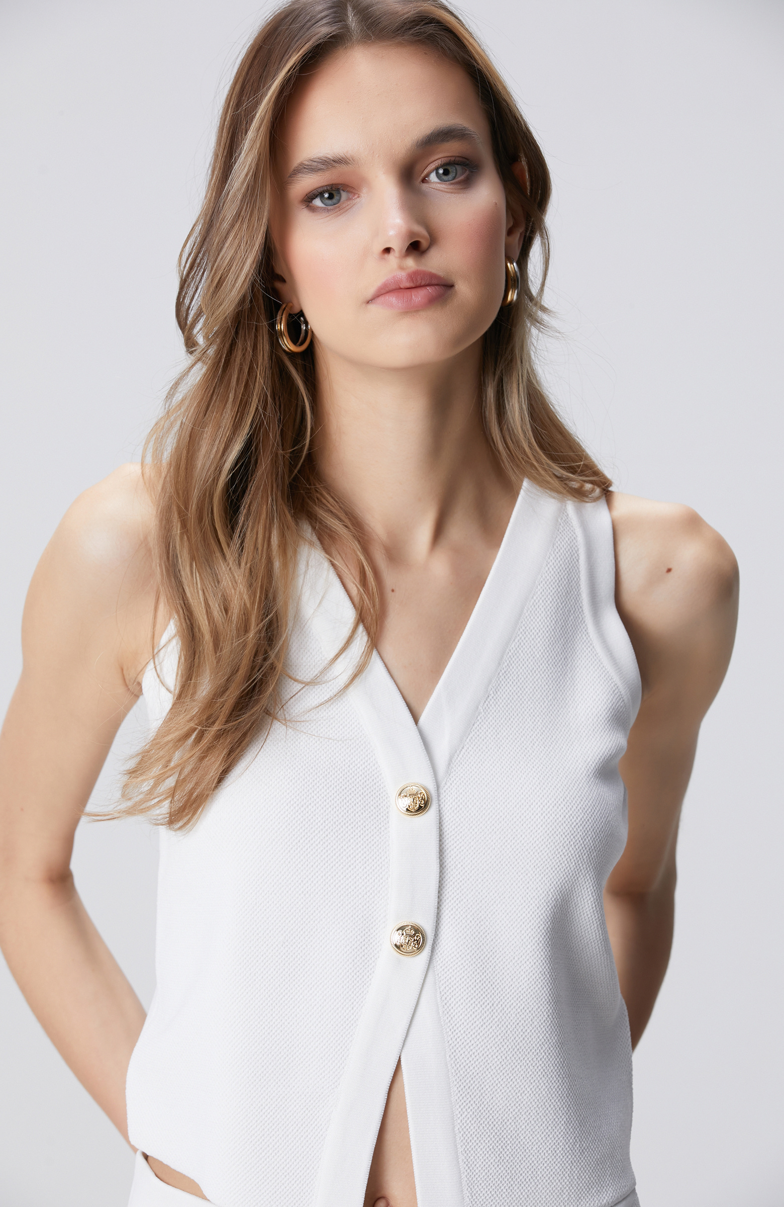 Kırık Beyaz Triko Yelek